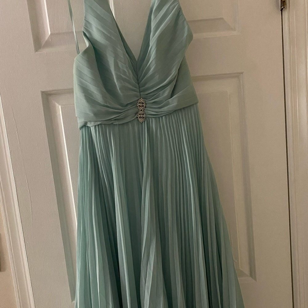 Shoulder less mint green mid knee gown